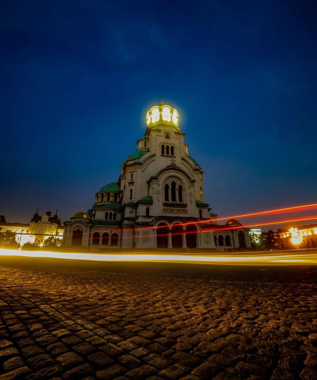 Sofia at night with soft lights around the cathedral, the city where the DrinkDrive.BG team works